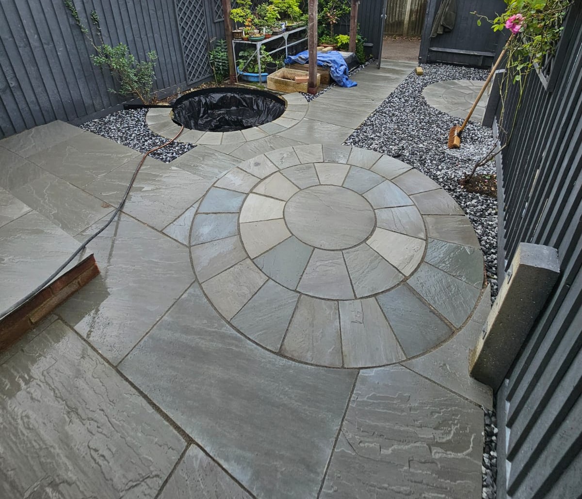 image of sandstone patio with patio ring installed